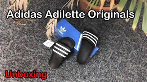 fake adidas slippers|adidas shoes knock off.